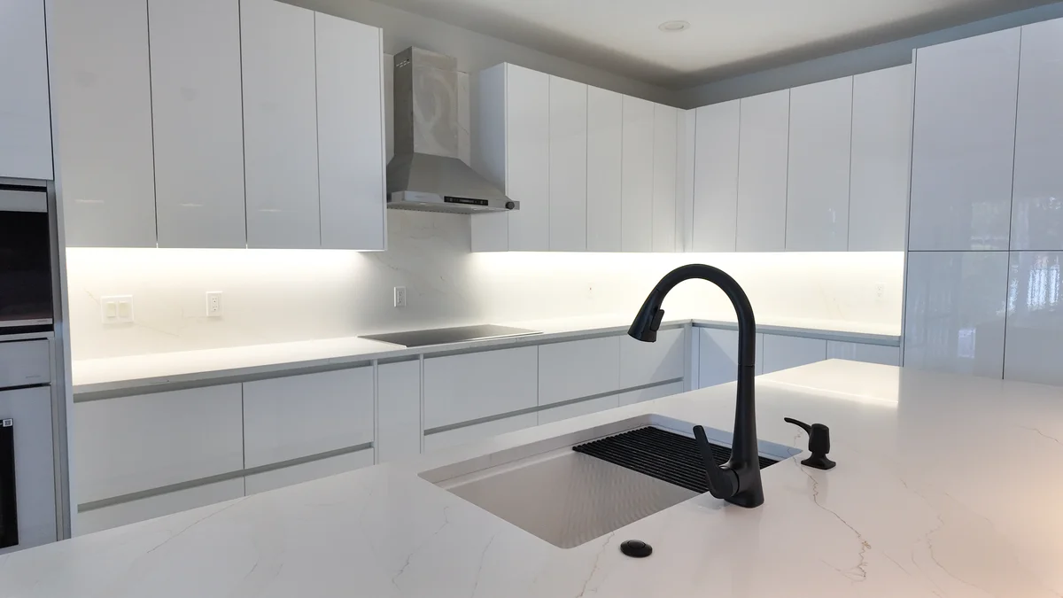 Natural-stone countertop installation in a South Florida kitchen by MIA Remodeling Contractors.