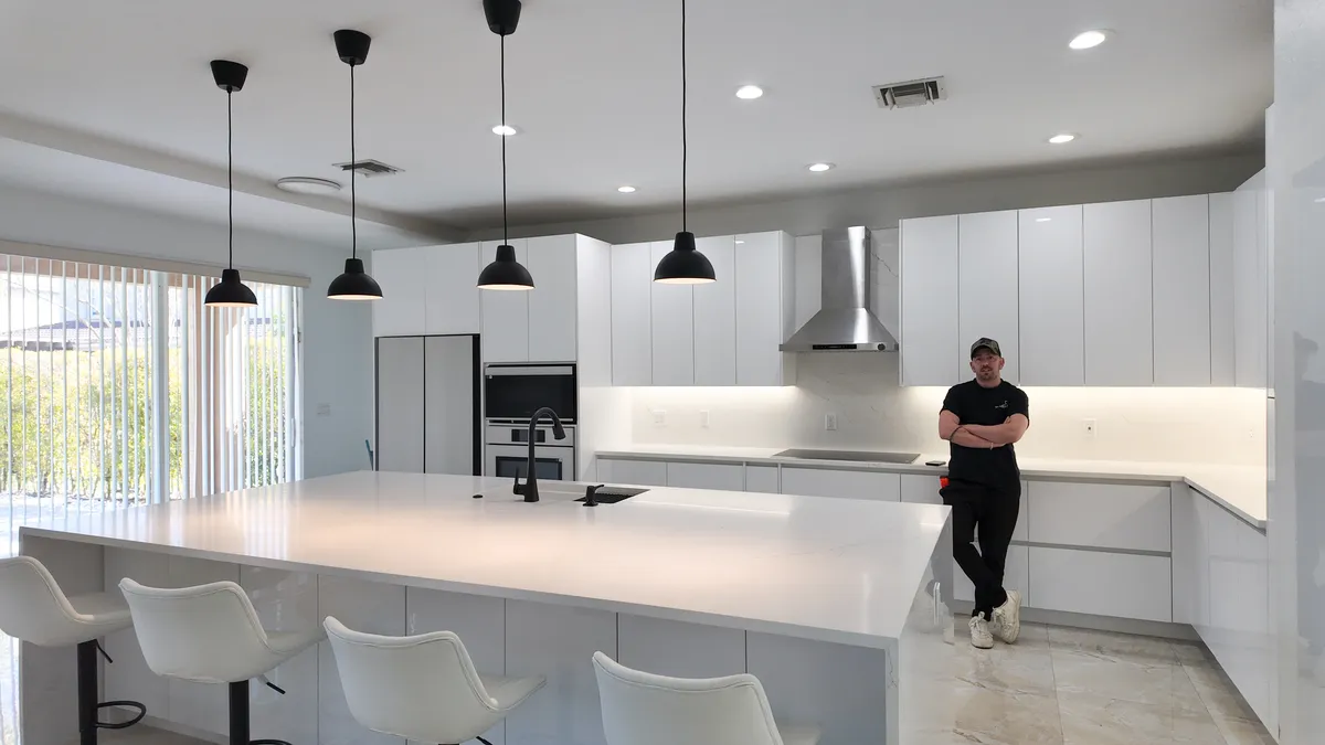 Full open-plan remodel, kitchen, dining and living in one frame