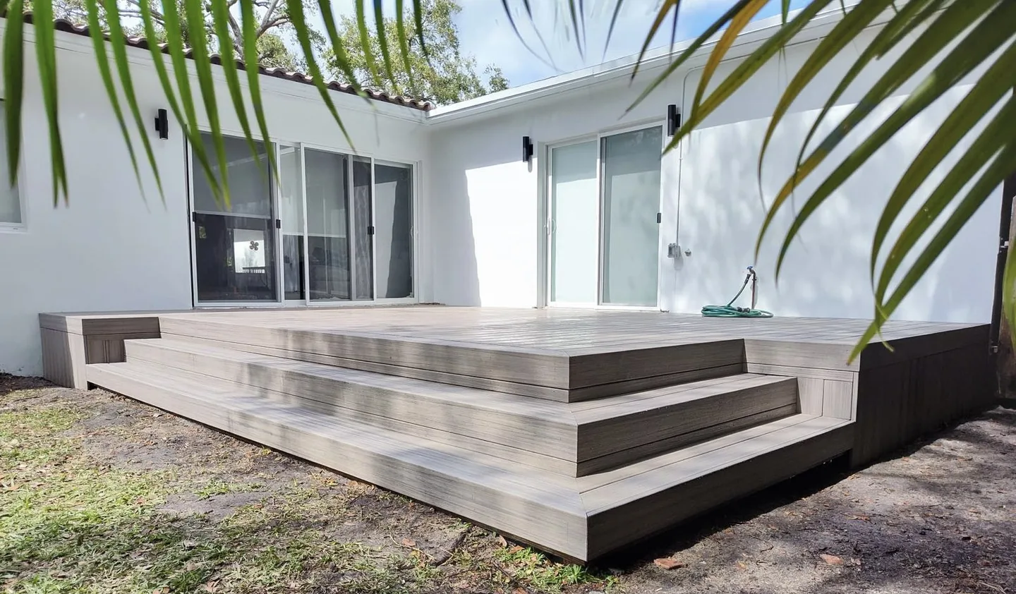 Modern Miami home with a raised patio addition that expands the living space