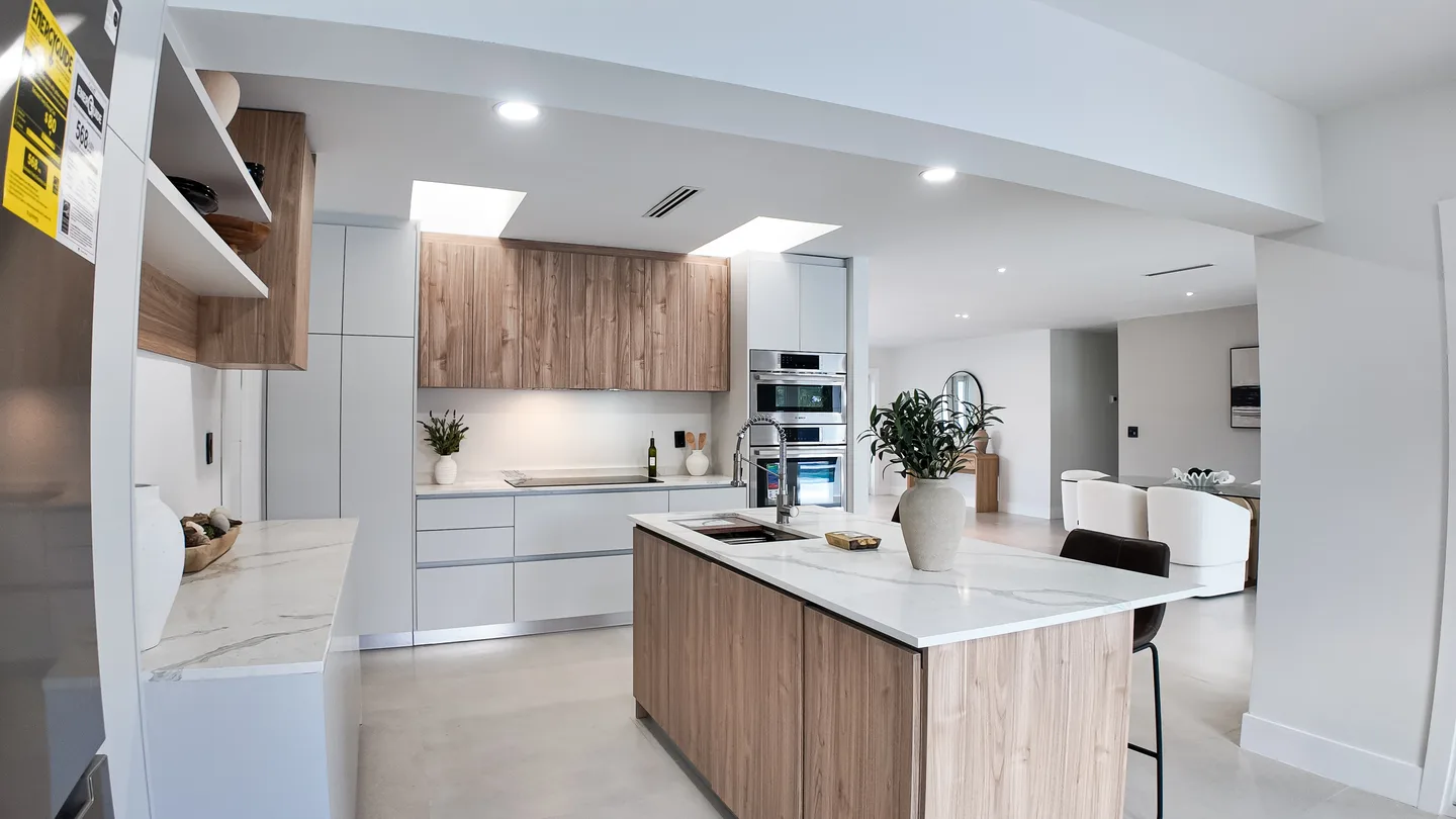 Open-plan kitchen and living remodel by a licensed general contractor in South Florida