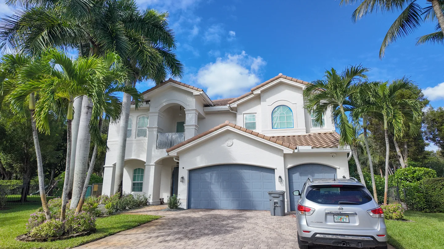 Two-story South Florida home with a renovated exterior by a licensed general contractor